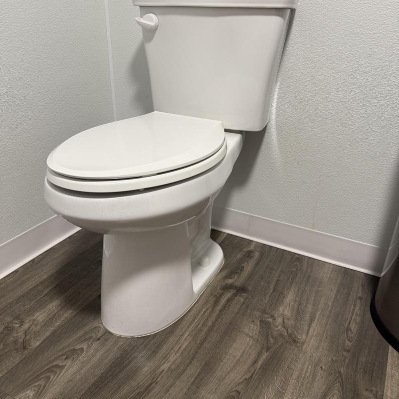Western Pottery elongated toilet with PVC baseboard