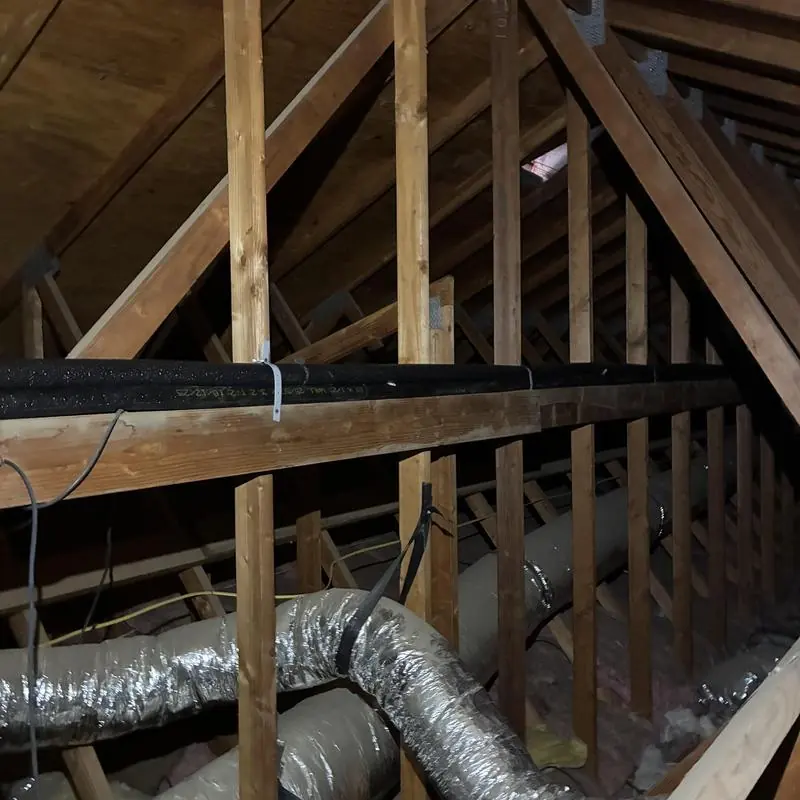 Hot water pipe re-route above master shower valve in attic