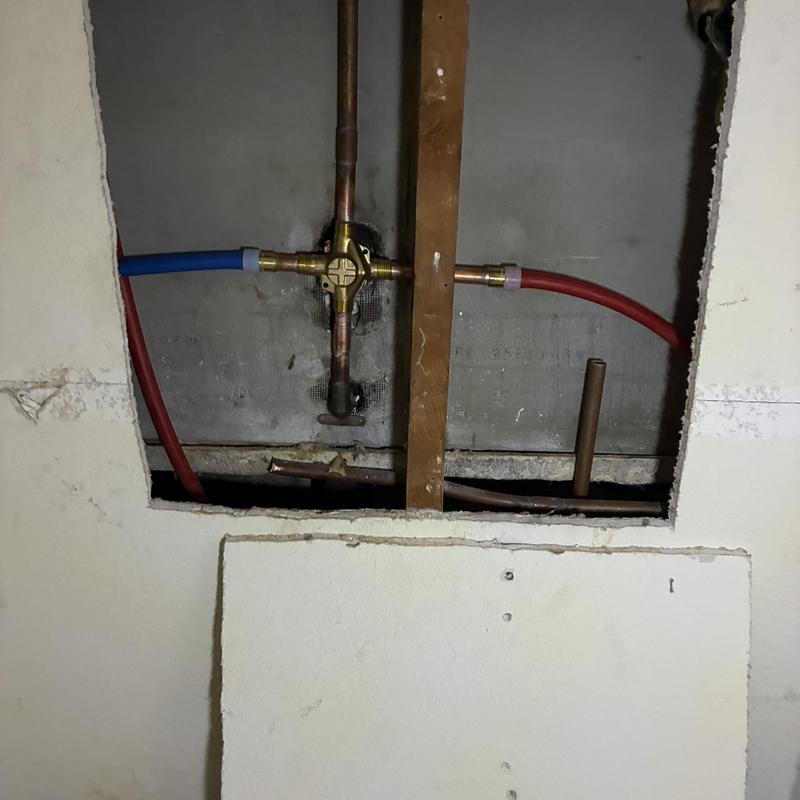 Master bathroom shower valve hot water re-route pipes