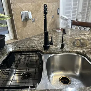 Moen oil-rubbed bronze pull-out spray faucet installed