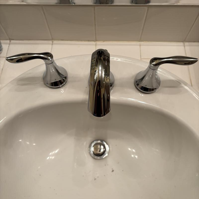 Moen widespread bathroom faucet with chrome handles