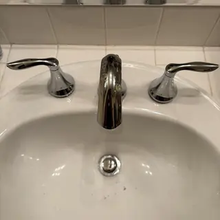 Moen widespread bathroom faucet with chrome handles