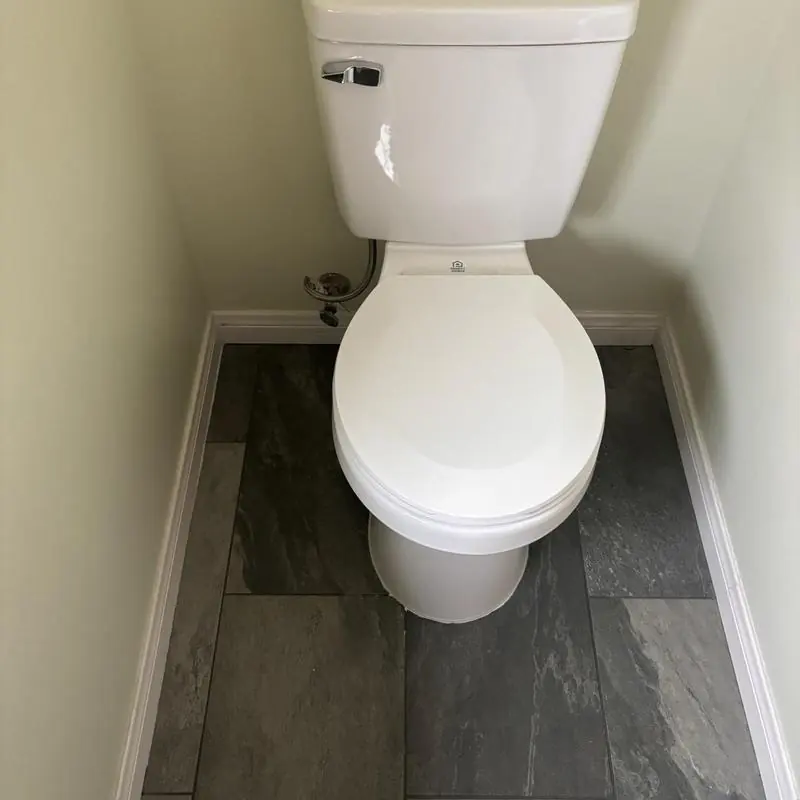 Toilet with 14 turn angle stop and stainless steel supply line