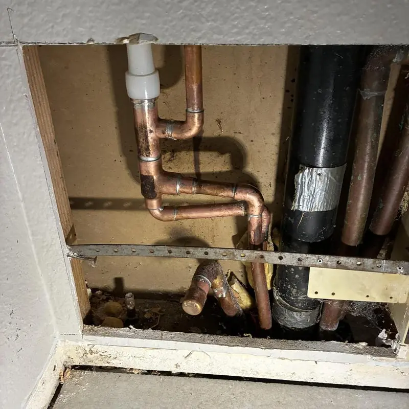 Copper hot water plumbing reroute in wall cavity