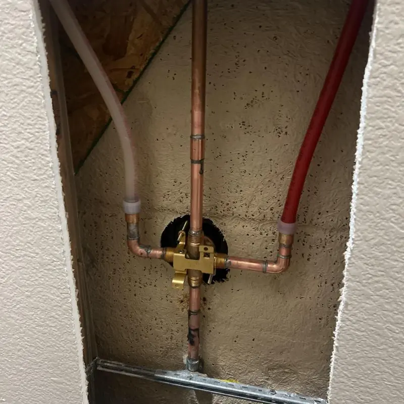 Shower valve installation with copper and PEX pipes