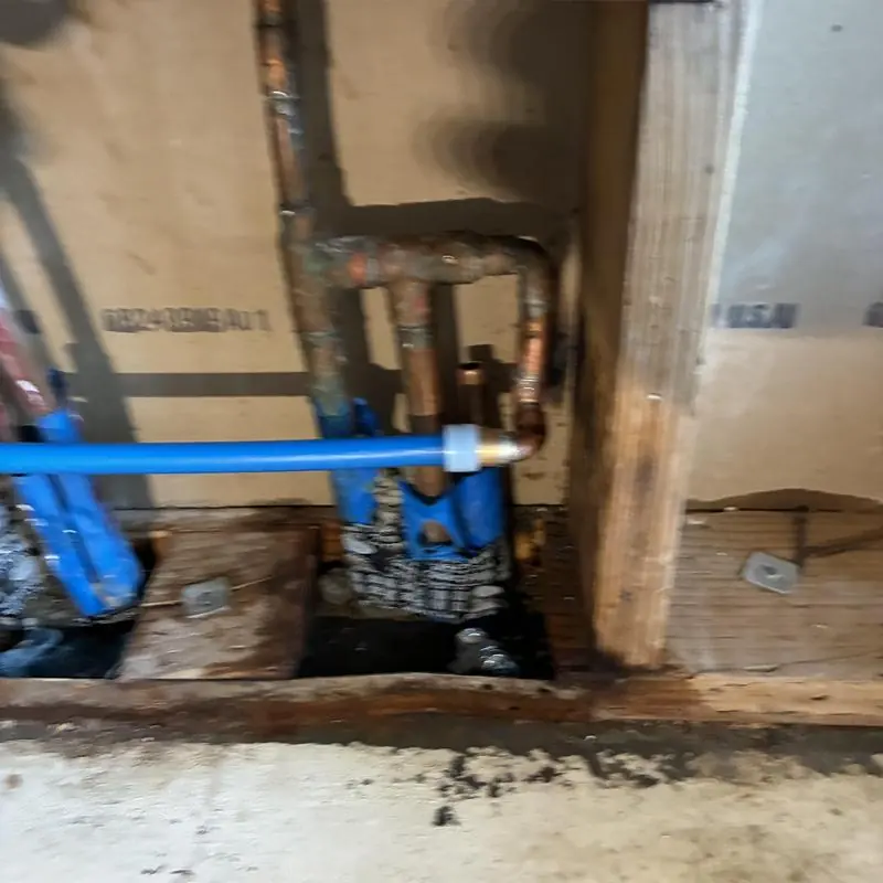 Cold-water ice-maker line slab leak reroute inside a Wildomar wall