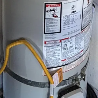 Water heater replacement with upgraded gas line connection
