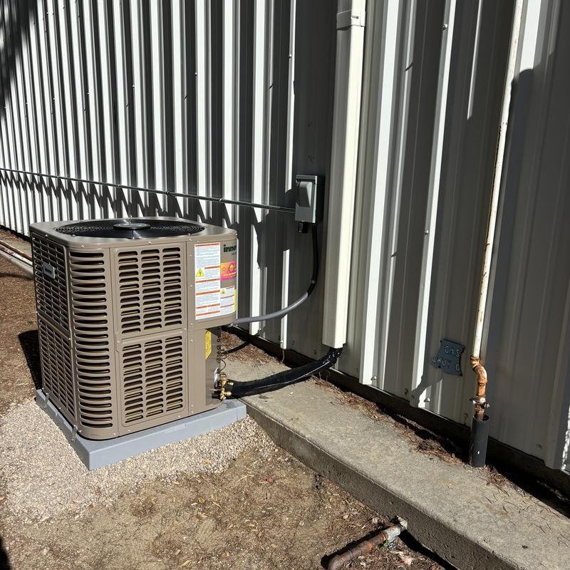 Innovair 20 SEER heat pump unit outside building