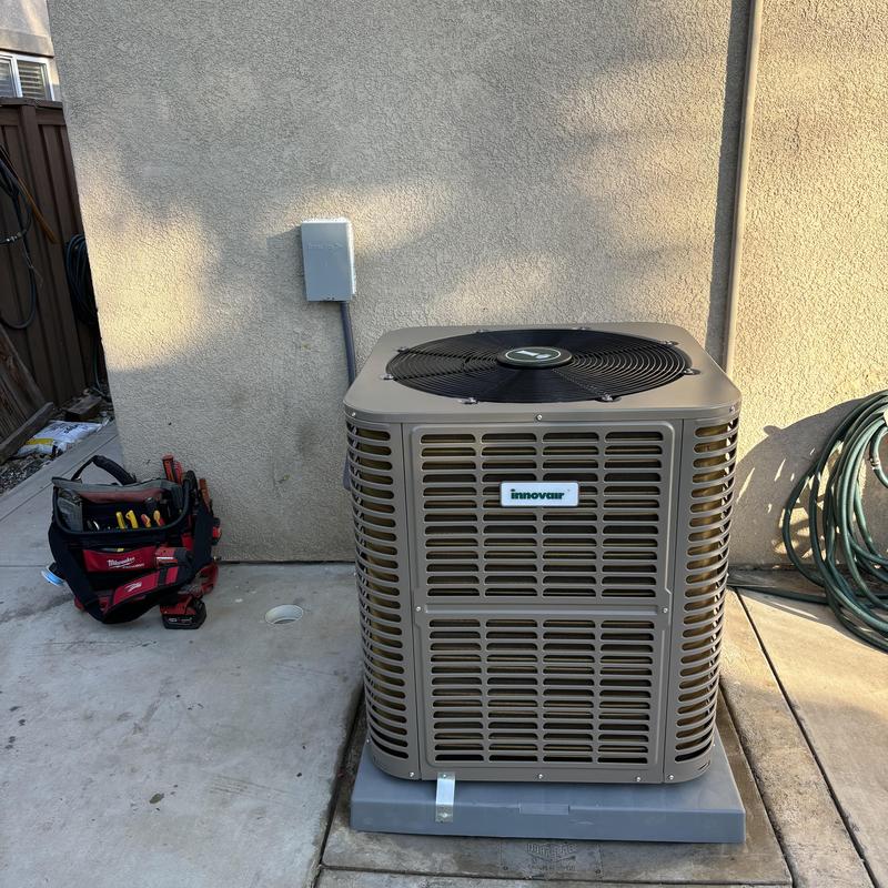 Innovair 5 ton 20 SEER heat pump on concrete pad