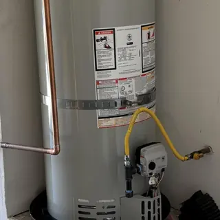 50 Gallon Bradford White Water Heater with pan and flex lines