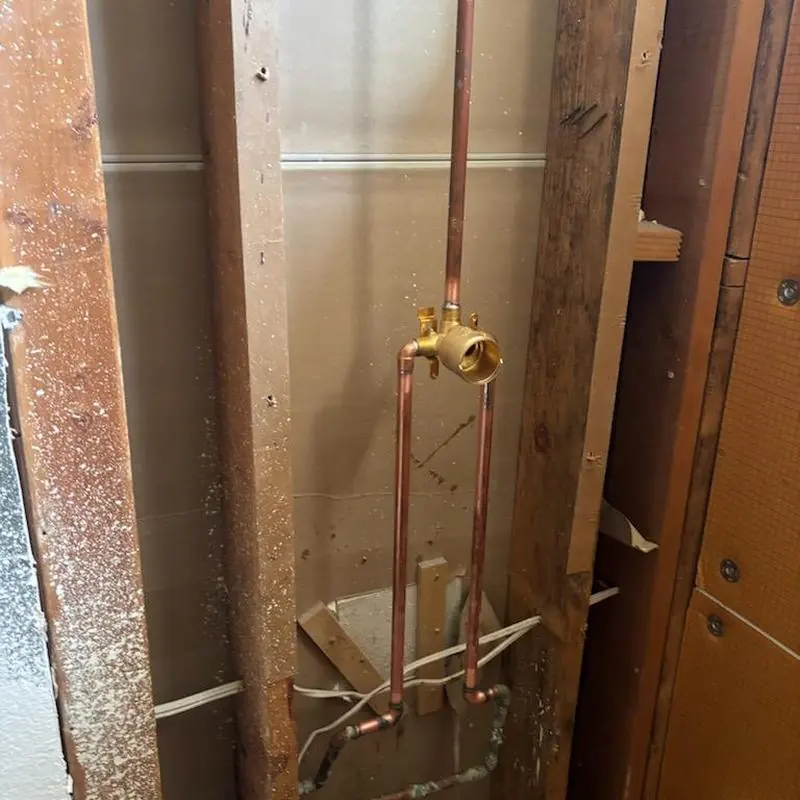 Shower valve installation with copper piping in wall cavity