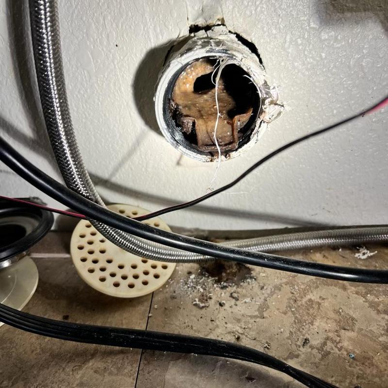 Kitchen drain pipe with clog and debris removal