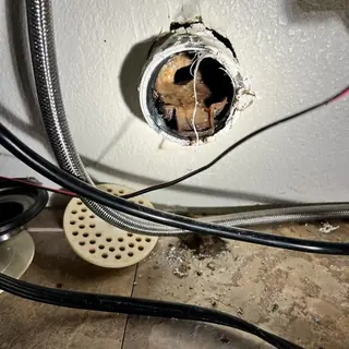 Kitchen drain pipe with clog and debris removal