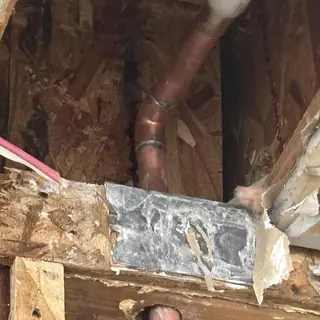PEX pipe repair behind a water heater
