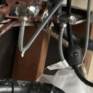 Cold water supply valve with leak under sink