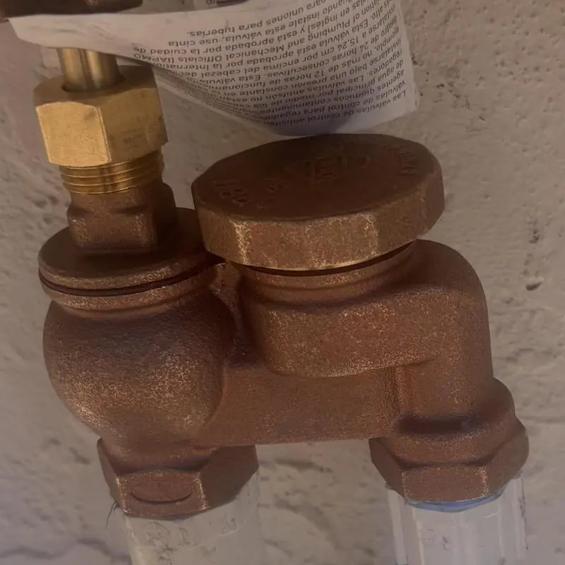 Anti-siphon valve with brass fitting installation