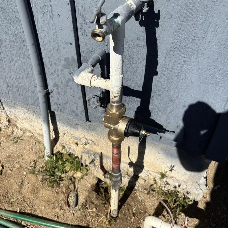One-inch pressure regulator installed on an outdoor water line in Wildomar