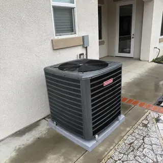 Goodman 4 Ton Air Conditioner Unit Outside Home