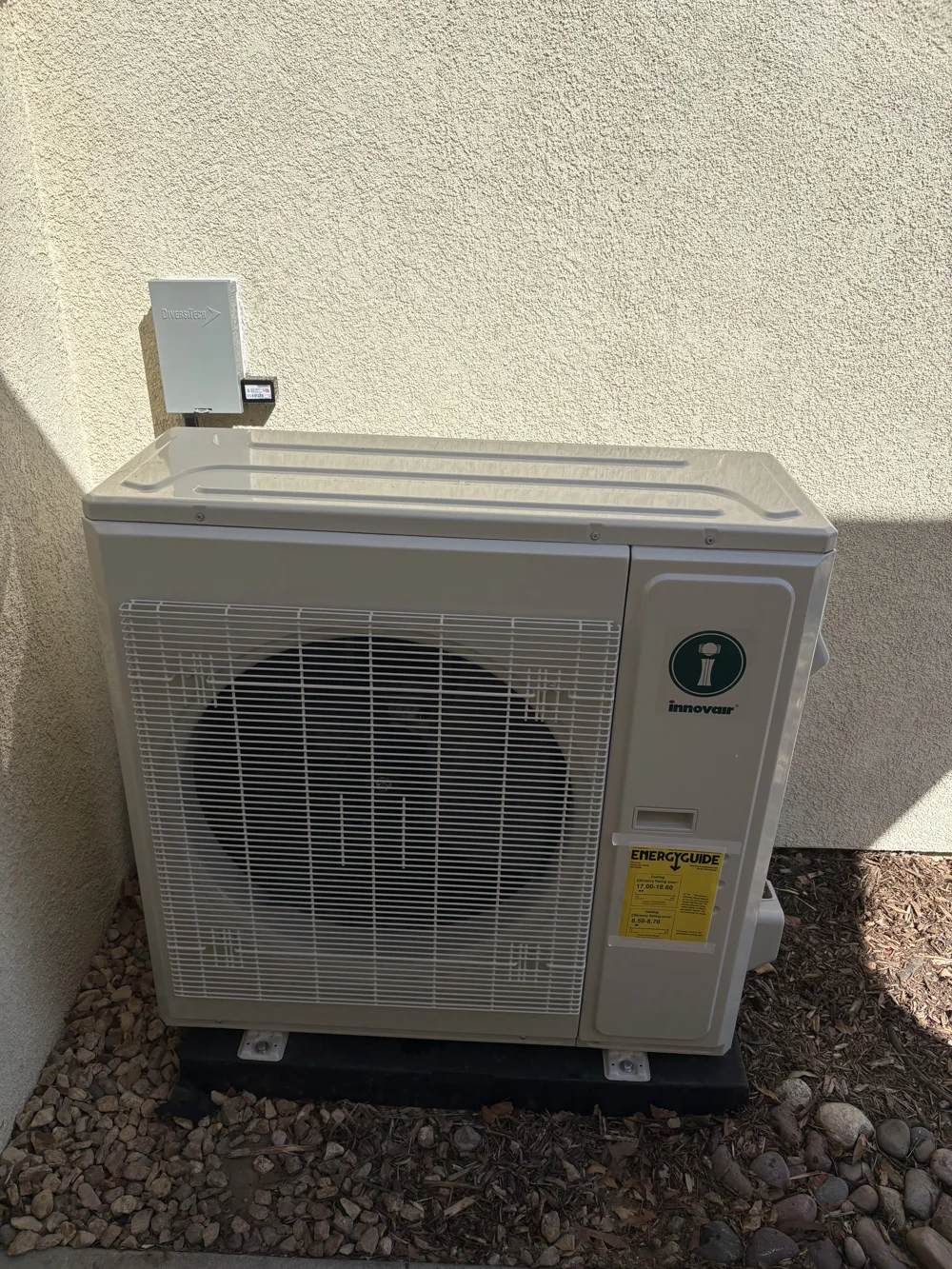 Innovair slim line outdoor unit installed on a pad in Hemet, CA